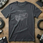 Dark grey t-shirt with white line drawing of Arriflex 35 BL camera and "EST. 1975".
