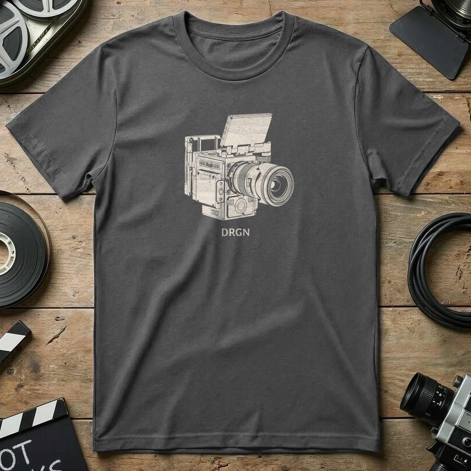 T-shirt with graphic of vintage camera and "DRGN" text.