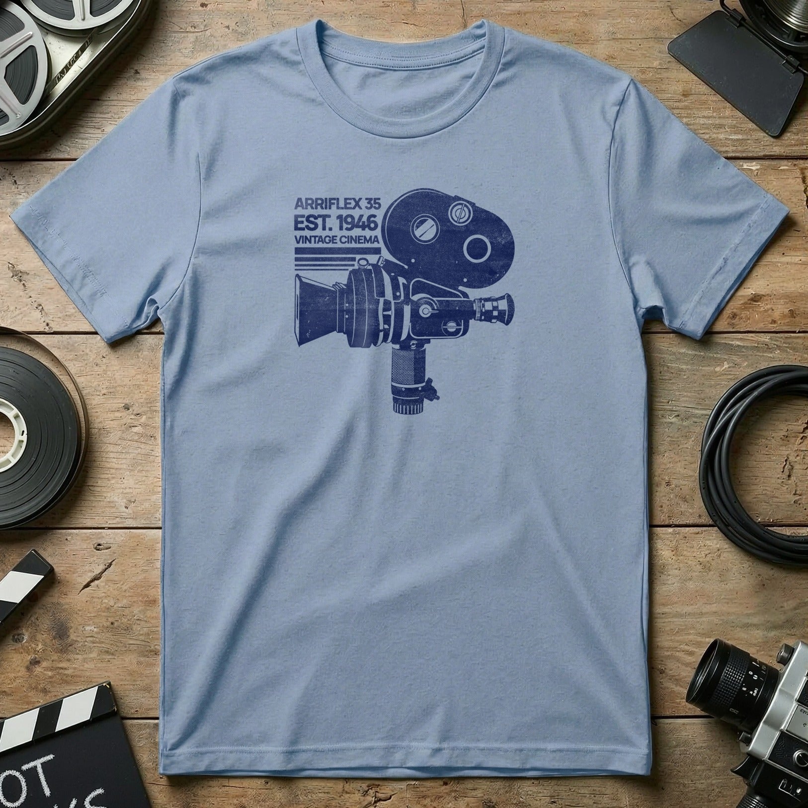 Blue t-shirt with "Arriflex 1946 Vintage Cinema" graphic of a vintage film camera.