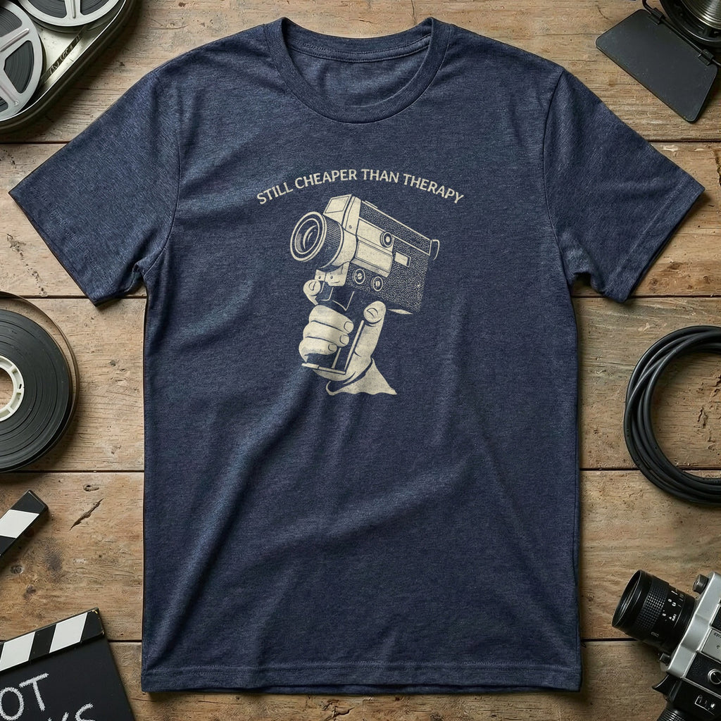 Dark t-shirt with vintage camcorder held in hand graphic and text.
