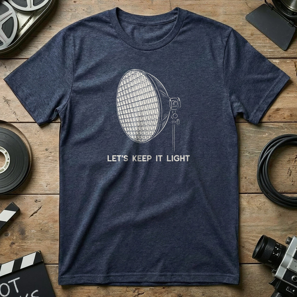 T-shirt with illustration of a spotlight and text "Let's Keep It Light."