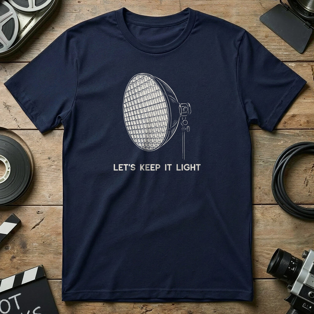 Navy t-shirt with a graphic of a spotlight and text "LET'S KEEP IT LIGHT."