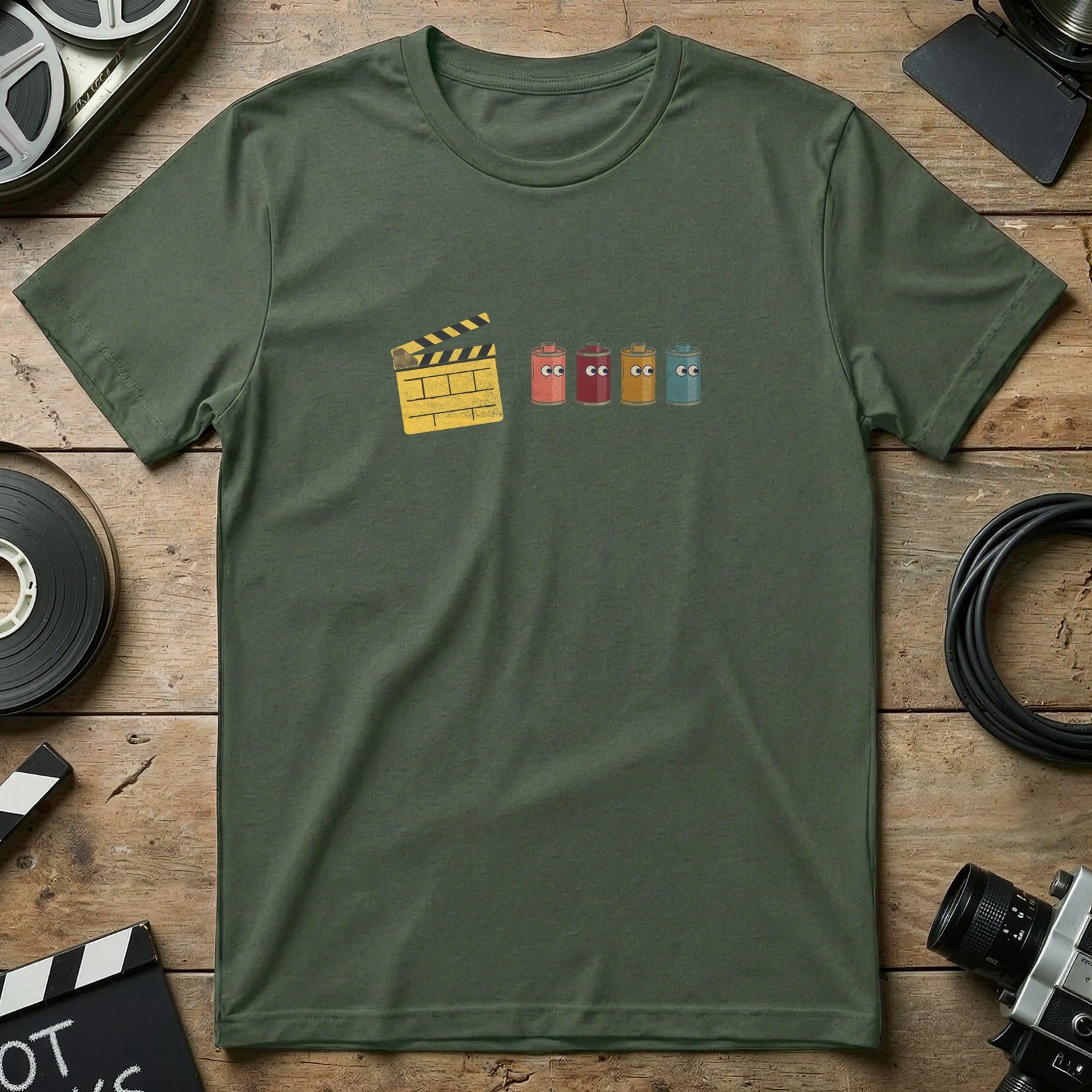 Green t-shirt with clapperboard and four cartoon film canisters.