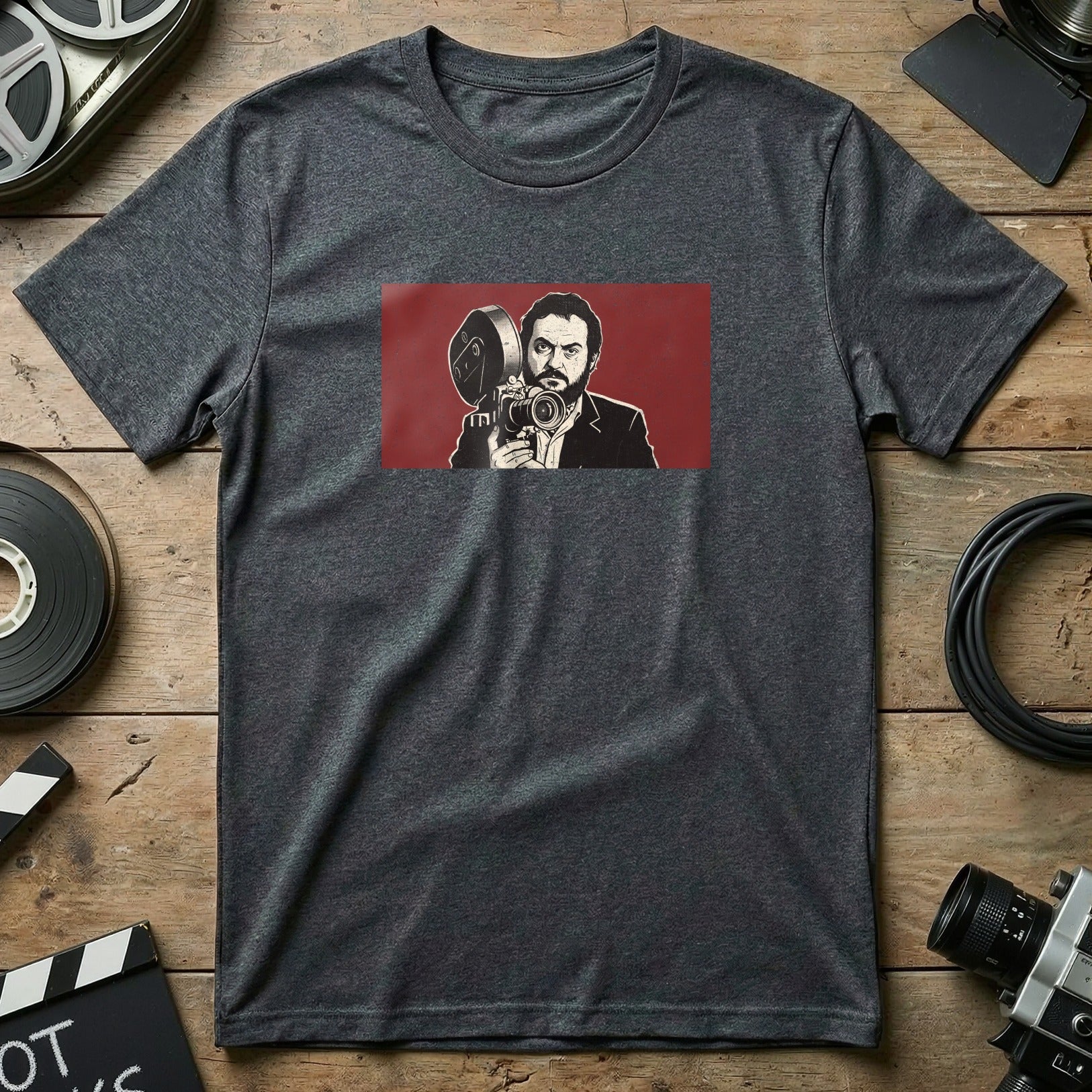 T-shirt with graphic of man holding vintage film camera.