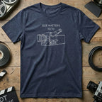 Dark t-shirt with line drawing of a film camera and "Size Matters 15/70" text.