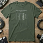 Green t-shirt with ARRI Signature Prime lens blueprint design.