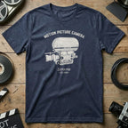Navy t-shirt with vintage movie camera graphic and "Motion Picture Camera" text.