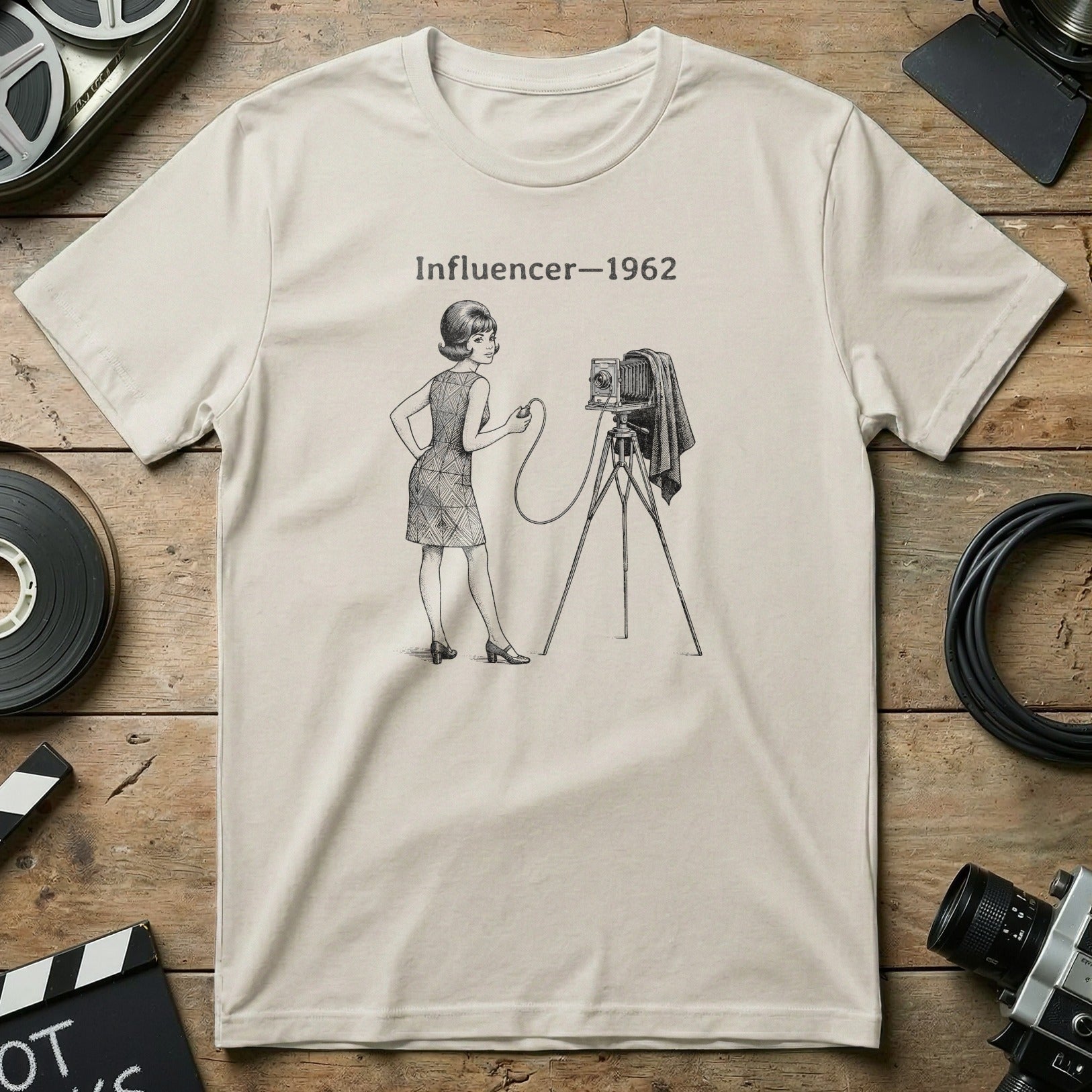 T-shirt featuring a vintage illustration of a woman with a camera.