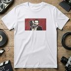 T-shirt with illustration of a man holding a vintage film camera.