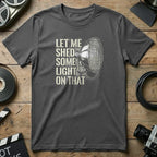 Gray t-shirt with "Let me shed some light on that" and spotlight graphic.
