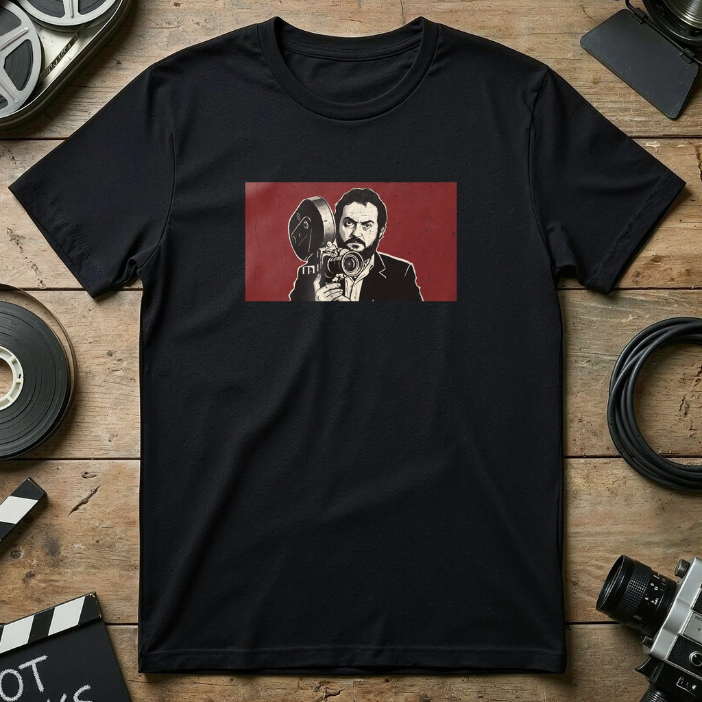 Stanley Kubrick holding a vintage movie camera, depicted on a black t-shirt.