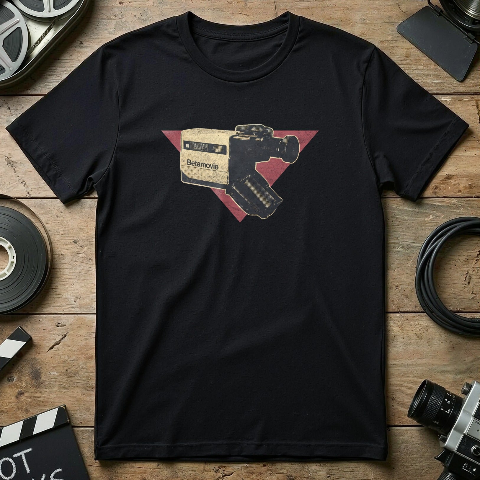 Black t-shirt with a vintage camcorder graphic and "Belamovie" text.
