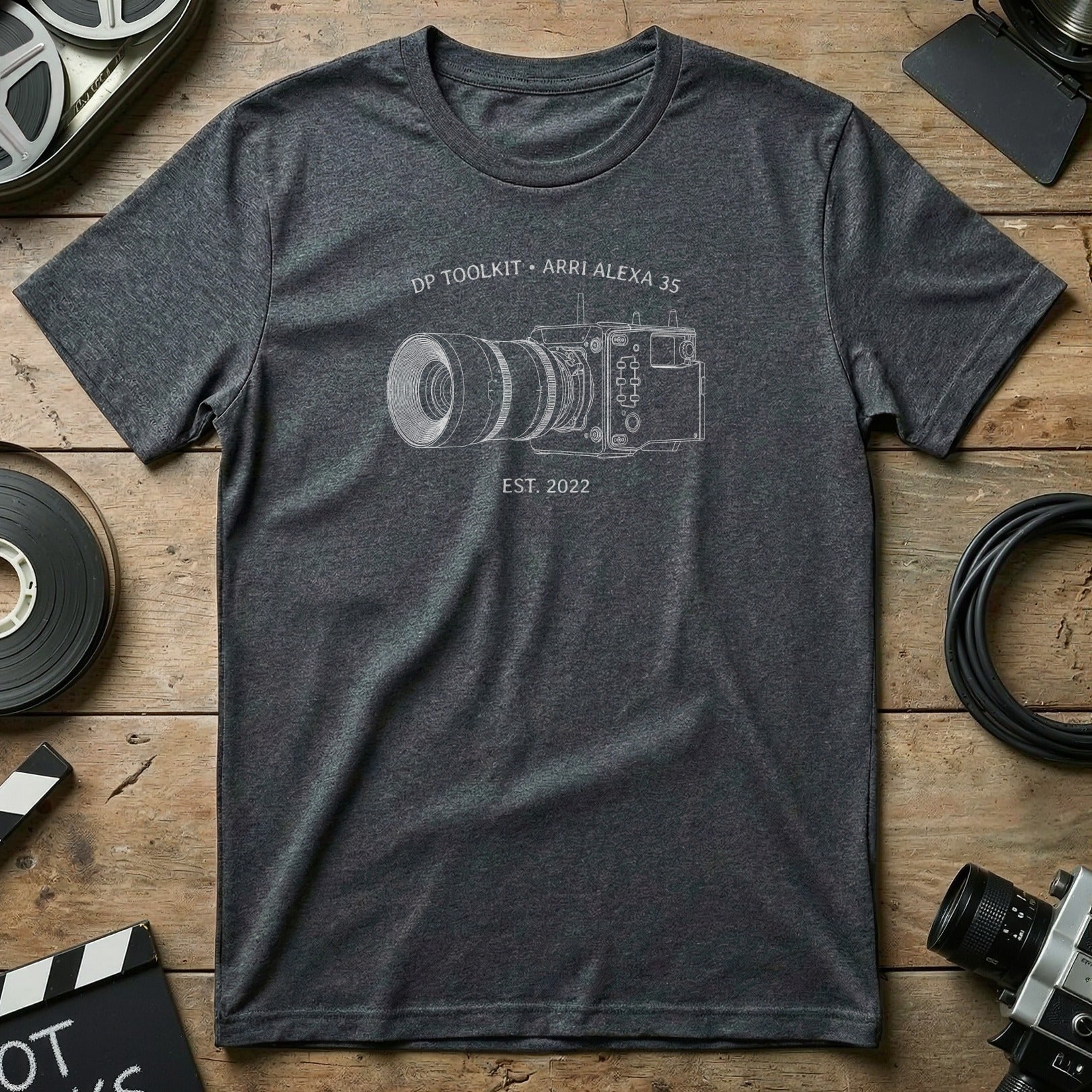 Dark grey t-shirt with line drawing of ARRI Alexa 35 camera and "EST. 2022".
