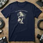 Navy t-shirt with "Still Cheaper Than Therapy" text and vintage camera graphic.