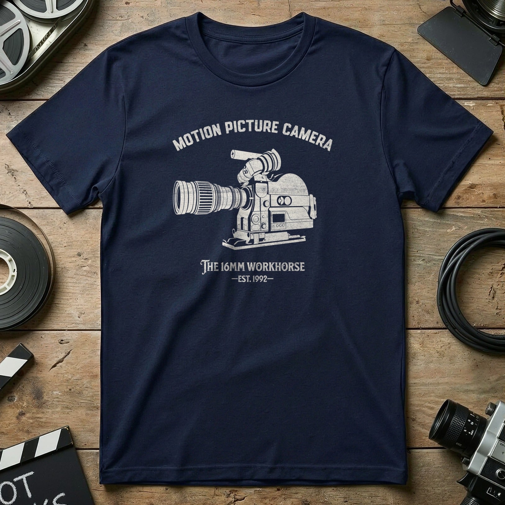 Navy t-shirt with white graphic of a 16mm film camera and text.