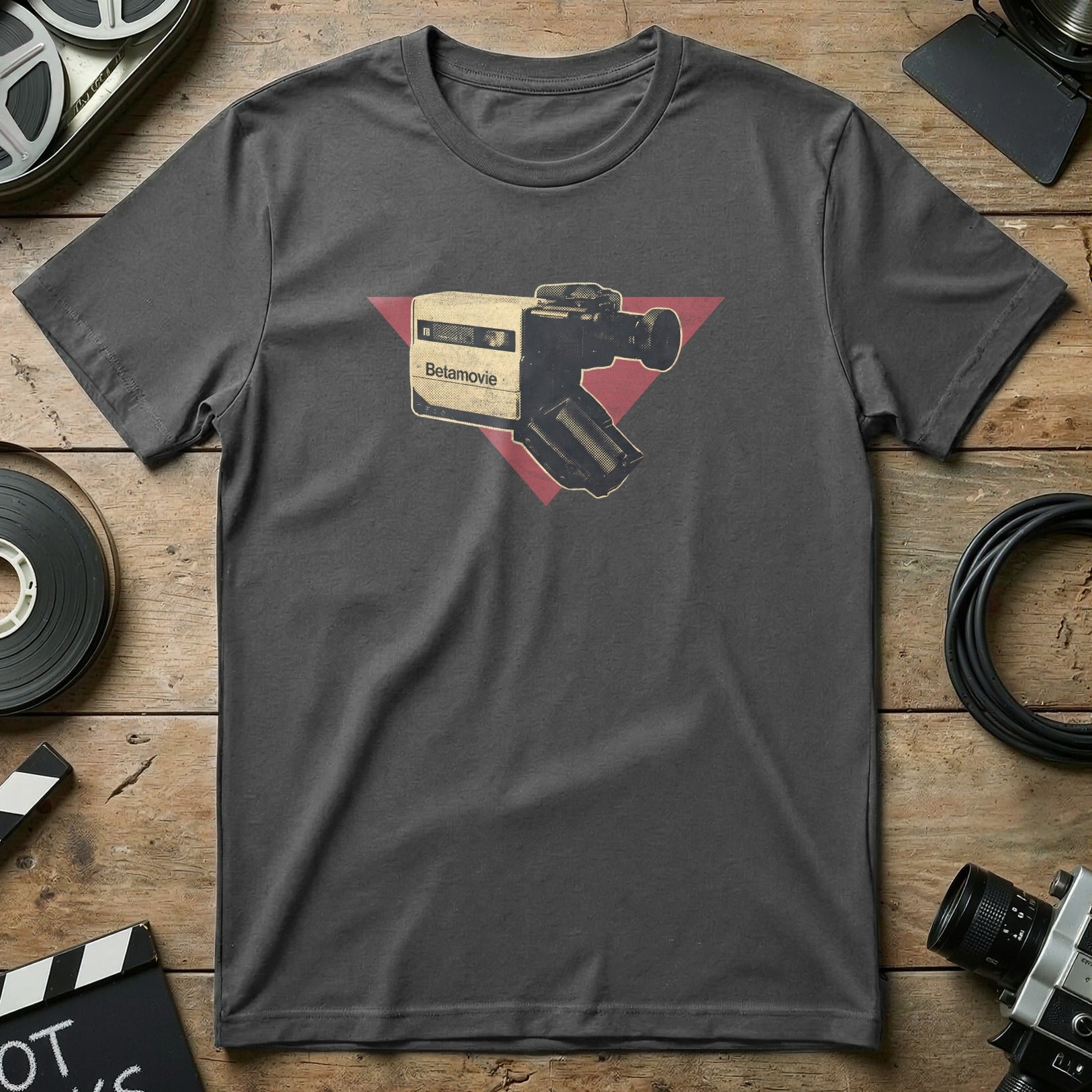 Dark grey t-shirt with retro video camera graphic and red triangle.