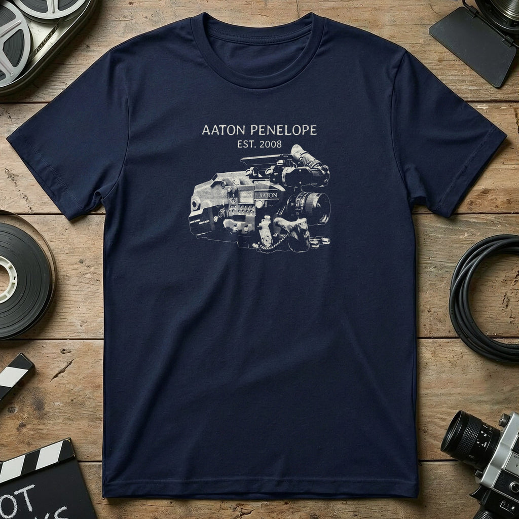 Navy t-shirt with "Aaton Penelope EST. 2008" and film camera illustration.