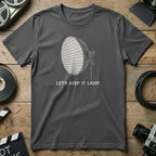 Dark grey t-shirt with "LET'S KEEP IT LIGHT" and a spotlight graphic.