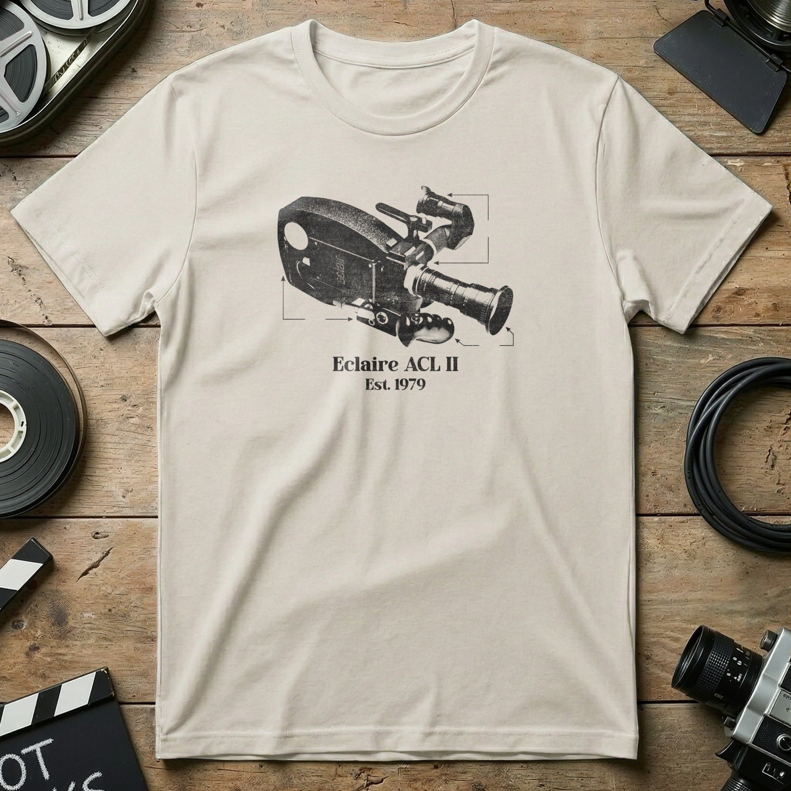 Cream t-shirt with Eclair ACL II camera graphic, Est. 1979.