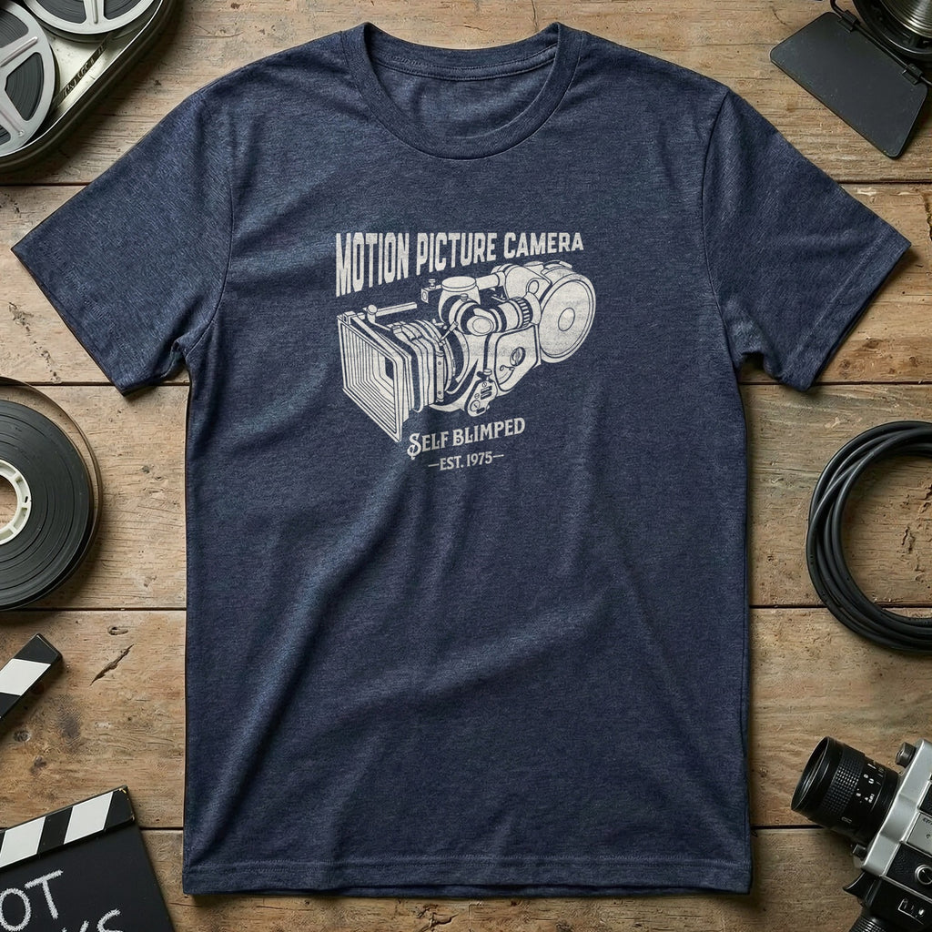 Dark blue t-shirt with "Motion Picture Camera Self Blimped Est. 1975" graphic.